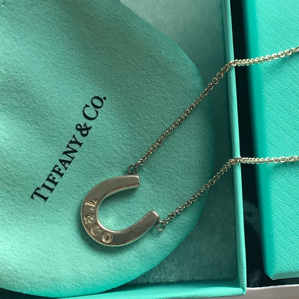 Tiffany and Co. Lucky horseshoe.  Sterling silver.  Authentic pouch
